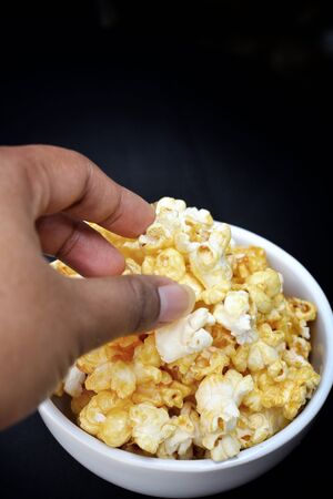 popcorn on the black backgroundの写真素材