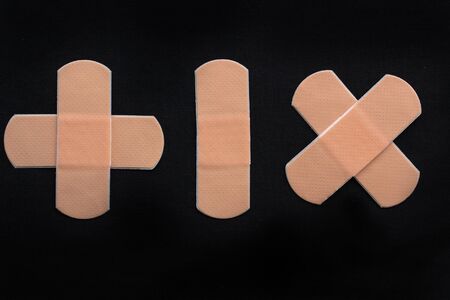 Medical adhesive bandage on black の写真素材