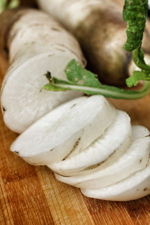 Daikon radish on the wood の写真素材