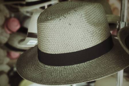 Hats are stacked for sale at the marketの写真素材