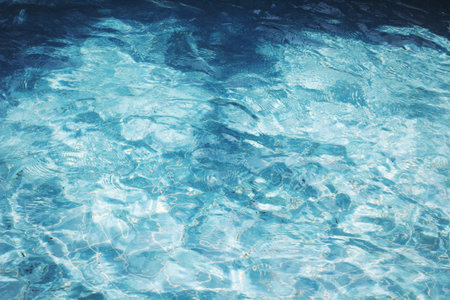Blue swimming pool rippled water detail