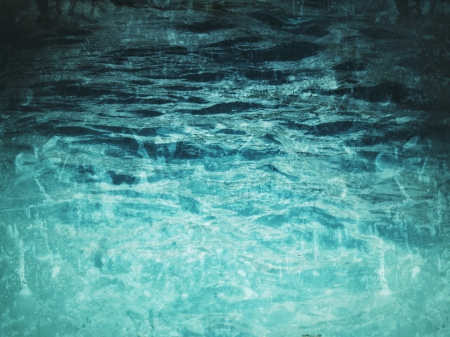 Blue swimming pool rippled water detailの写真素材