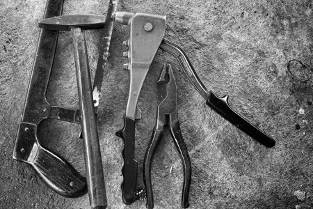 Hammer and tool on gray backgroundの写真素材