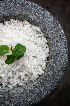 White sea salt on mortarの写真素材
