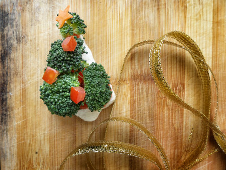 Christmas tree of bread  broccoli and tomatoes for christmas foodの写真素材