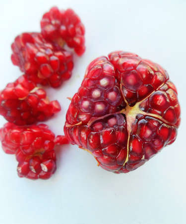Pomegranate fruit on white backgroundの写真素材