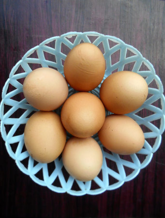 Fresh eggs in the basket.