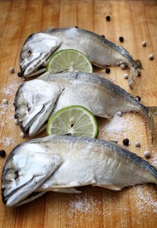 Steamed mackerel fish cutting board.の写真素材