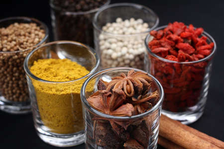 Spices and herbs in glass. cuisine ingredients.の写真素材