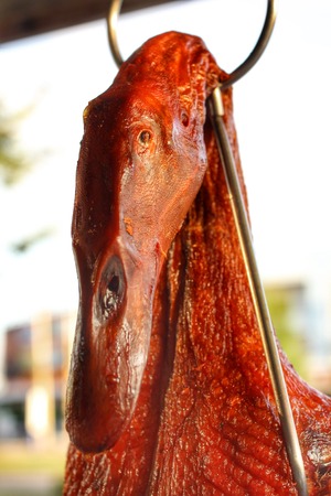 Whole roast duck in the markerの写真素材