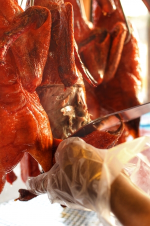 Whole roast duck in the markerの写真素材