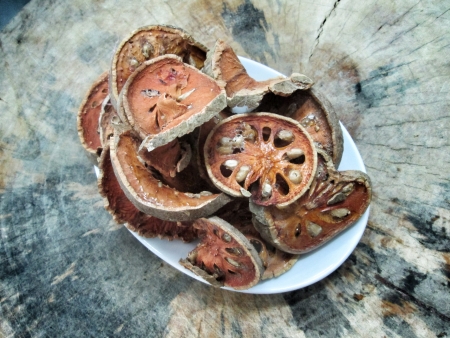 Slices of dried bael fruitの写真素材