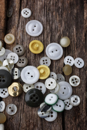 Buttons on the old wood background