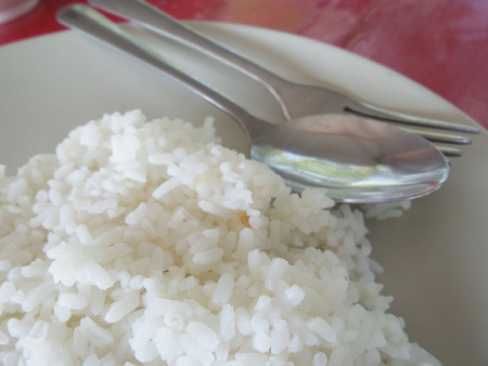 Close up of steaming riceの写真素材