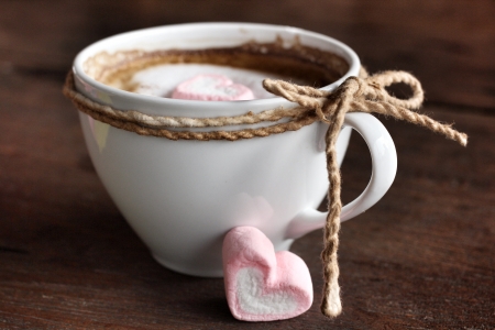 Hot chocolate with heart pink marshmallow for valentine's dayの写真素材