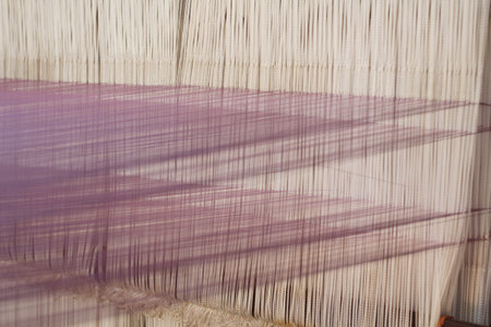 Closeup of weaving thread for the textile industry