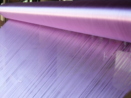Closeup of weaving thread for the textile industryの写真素材