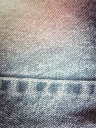 vintage jeans with seams background textureの写真素材