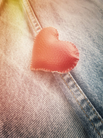 red heart on vintage jeans