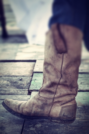 Close up of vintage cowboy bootsの写真素材