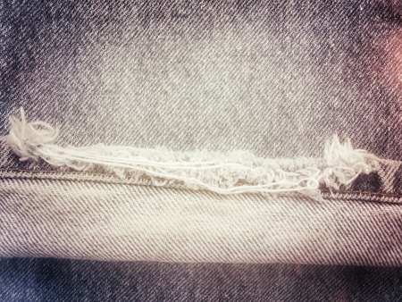 vintage jeans with seams background textureの写真素材
