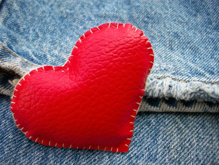 red heart on vintage jeans