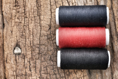 Black and red  bobbins thread background texture