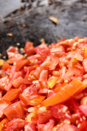 Tomato slice on the panの写真素材