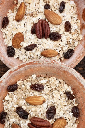Mix of tasty nuts and oat flakesの写真素材