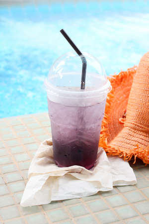 Purple drink in summer at poolsideの写真素材
