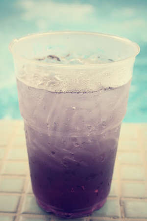 Purple drink in summer at poolsideの写真素材