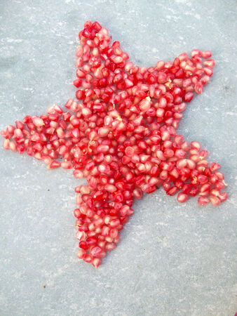 Seeds of ripe pomegranate fruitの写真素材