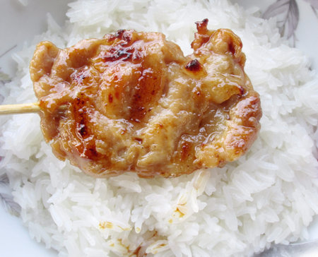 BBQ grill of meat and sticky riceの写真素材