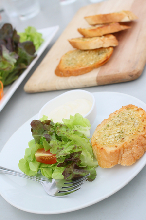 Salad - garlic and herb breadの写真素材