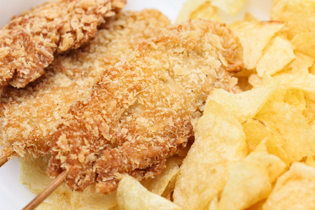 Fried chicken with potato chipsの写真素材