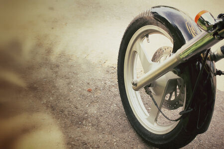 Driver riding motorcycle on the roadの写真素材