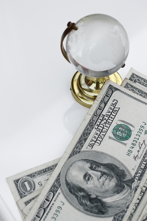 Dollar with globeの写真素材