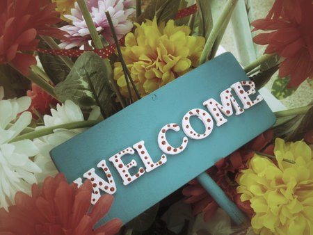 Welcome sign and flowerの写真素材