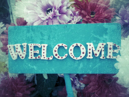 Welcome sign and flowerの写真素材
