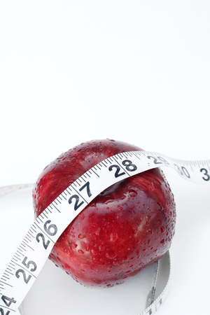 measure tape and appleの写真素材