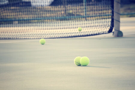 Tennis balls on the courtの写真素材