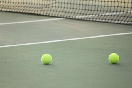 Tennis balls on the courtの写真素材