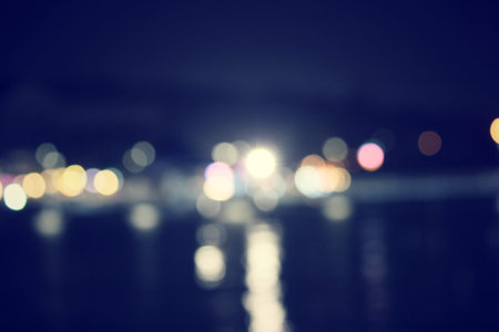 blurred of car in city at nightの写真素材