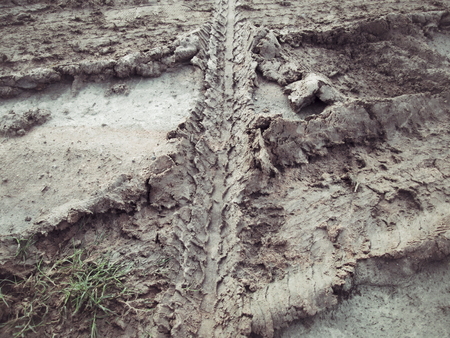 Wheel tracks on the soil.の写真素材