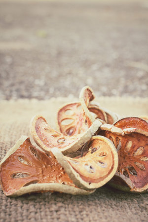 Slices of dried bael fruit