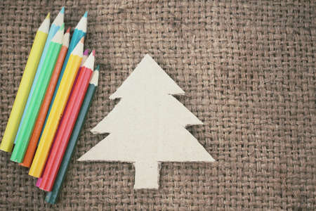 Paper christmas tree and colorful pencilsの写真素材