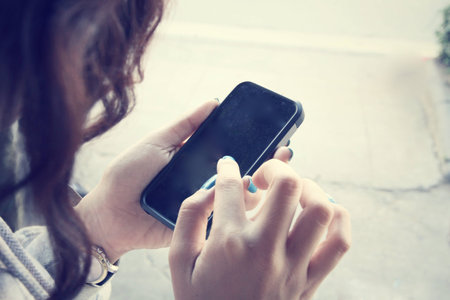 woman using smart phone