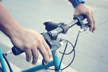 Hand with bikeの写真素材