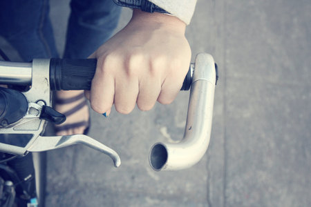 Hand with bikeの写真素材