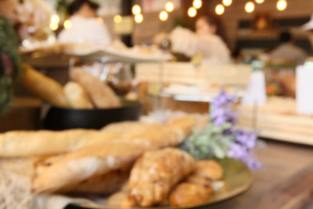 blurred of fresh bread at bakery shopの写真素材